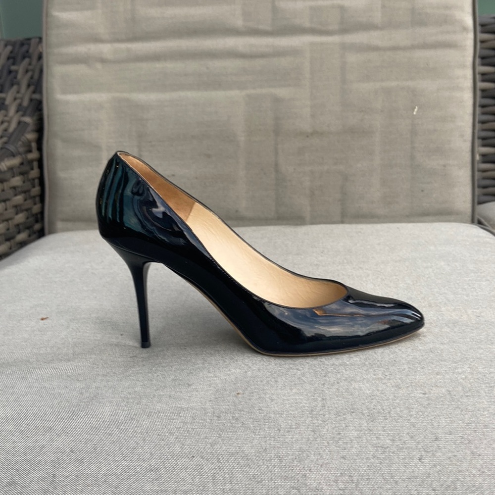 Jimmy Choo black patent pumps size 9/39. Rounded toe. 3.75” stiletto heel.